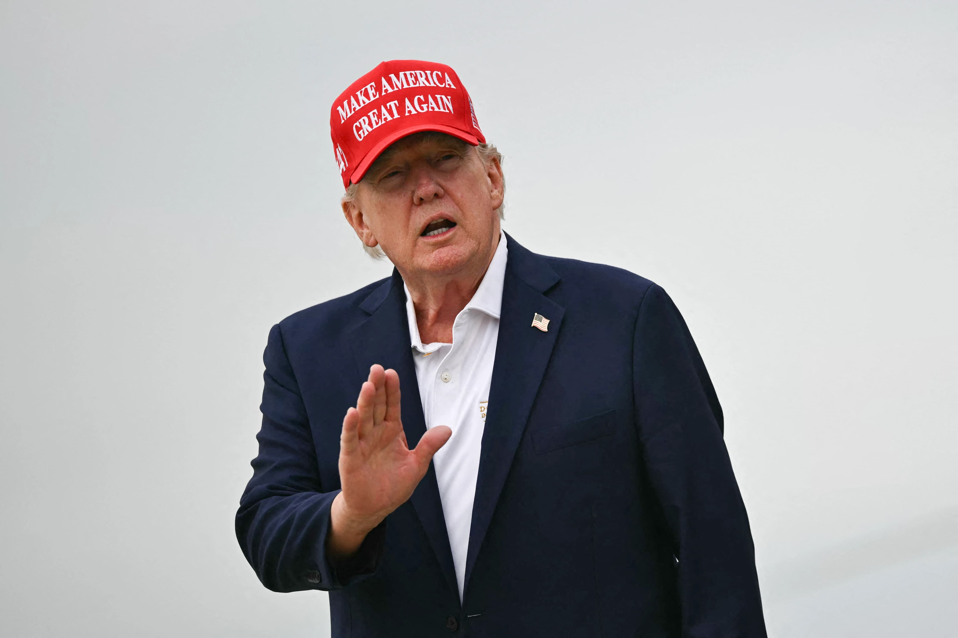 Trump says he is in no hurry for Iran deal as pressure mounts on Tehran