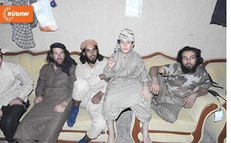 Rudaw file photo of an ISIS child soldier (second from right) with three other militants found in the group's cell phones.