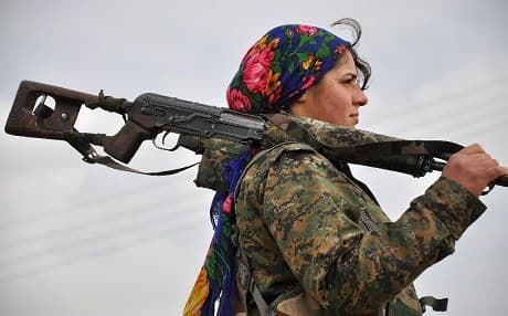 A fighter with the Kurdish Women’s Protection Units (YPJ). Photo: Delil Souleiman/AFP