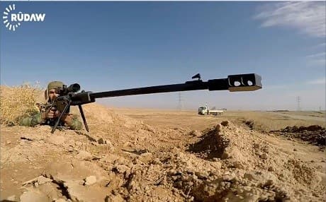 A member of Rojava Peshmerga, trained by the Kurdistan Regional Government, takes aim with his long-range weapon. Photo:Rudaw video