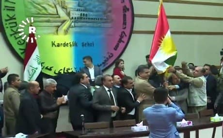 Placing the Kurdistan flag inside Kirkuk Provincial Council after it approved raising the flag across the province's governmental buildings. Photo: Rudaw video