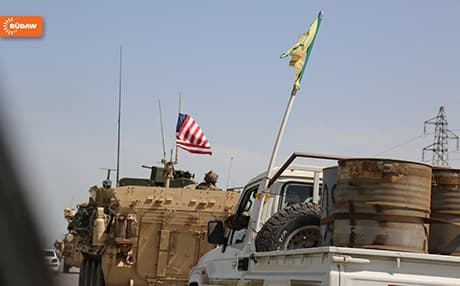 A convoy of vehicles flies US and YPG flags this week in northern Syria. Photo: Rudaw
