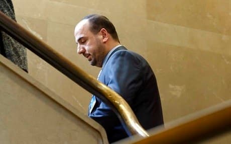 Syria's main opposition High Negotiations Committee (HNC) leader Nasr al-Hariri arrives to take part in May 2017 negotiations with UN Special Envoy of the Secretary-General for Syria Staffan de Mistura. Photo: Salvatore Di Nolfi | AP