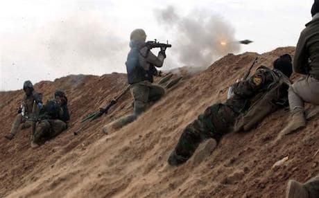 Hashd al-Shaabi paramilitary units advance towards a village, west of the city of Mosul, northern Iraq. Photo: Ahmad Al-Rubaye | AFP