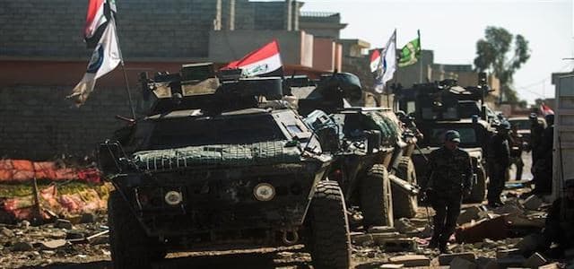 Iraqi forces' armored vehicles advance in western Mosul. AFP file photo