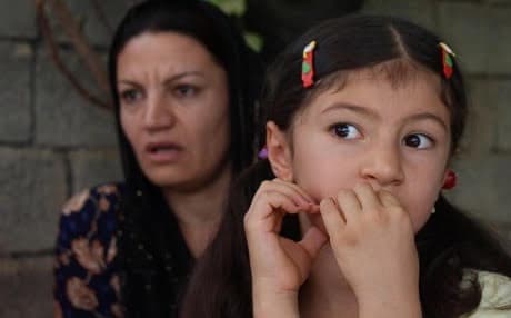 Five-year old Ilya with her mother Qumri Ahmed. Photo: Hannah Lynch/ Rudaw
