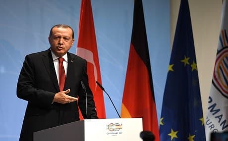 Turkish President Recep Tayyip Erdogan speaks to the press on the sidelines of the G20 summit in Hamburg, Germany, on Saturday. Photo: Patrik Stollarz | AFP