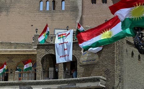 Kurdish flags and posters reading "Yes to referendum" hang on the walls of the ancient citadel in downtown Erbil. Photo by Farzin Hassan/Rudaw