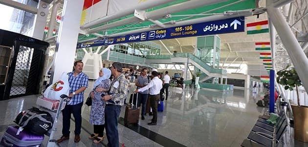 Passengers are seen at Erbil airport, in the capital of Kurdistan Region on September 28, 2017. Iraq has ordered all international flights to and from Kurdistan to be suspended over Monday's independence referendum. / Photo: AFP/Safin Hamed