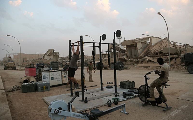US Marines exercise outside al-Qaim train station on Iraq's border with Syria on Monday. Photo: Khalid Mohammed/AP