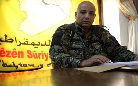 Talal Silo delivers a statement for SDF in Hasakah province. File photo: AFP