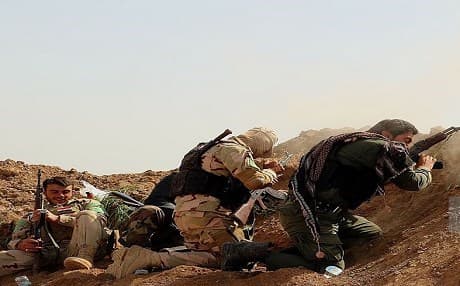 Shiite militias of Hashd al-Shaabi launcing an assault against ISIS militant in southern Kirkuk. Photo: AA/File