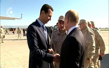 Russian President Vladimir Putin speaks at Khmeimim air base during his first visit to Syria since the civil war began in 2011. Photo: Kremlin video