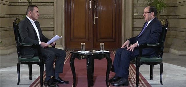 Iraqi VP Nouri al-Maliki (right) speaks with Ranj Sangawi, a Rudaw presenter, during an interview in Baghdad on Thursday. Photo: Rudaw