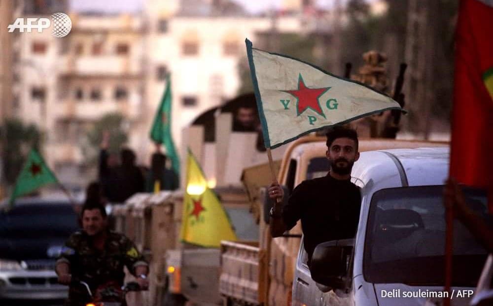 Kurds in Qamishli celebrate the defeat of ISIS in Raqqa in October. Photo: Delil Souleiman/AFP