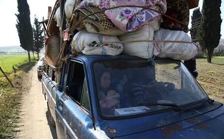 Syrian civilians fleeing Afrin on March 13, 2018. Photo: AFP / Nazeer al-Khatib