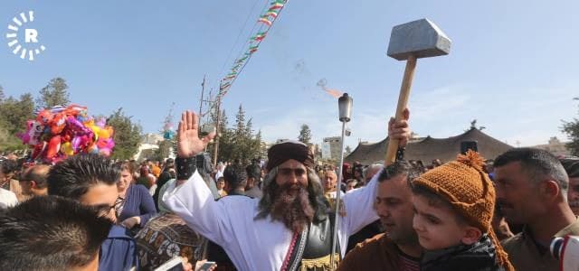 A man in Sulaimani city dresses up as Kawa the blacksmith, the statue of whom was recently demolished by Turkish-backed forces in Afrin canton on March 18, 2018. Photo: Rudaw/Sartep Othman