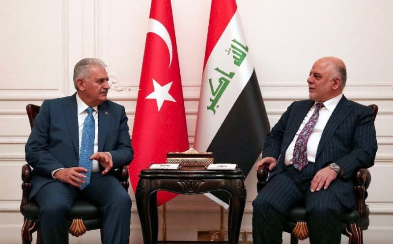 Turkish Prime Minister Binali Yildirim and Iraqi Prime Minister Haider al-Abadi meeting in Baghdad in January 2017. Photo: Hakan Goktepe/AFP/File
