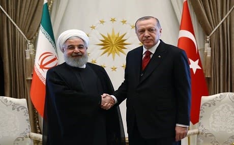 Iranian President Hassan Rouhani (L) shakes hands with Turkish President Recep Tayyip Erdogan (R) on April 4, 2018 in Ankara. Photo: Kayhan Ozer / AFP