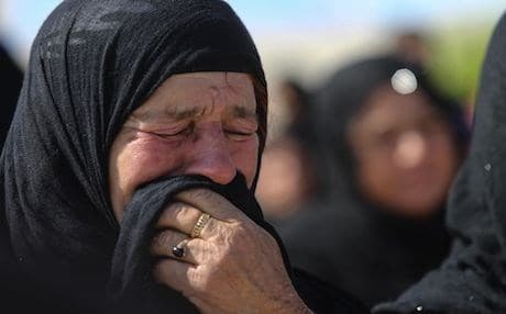 A sobbing elderly in Chamchamal commemorates the 30th Anfal anniversary along with hundreds more, on Saturday April 14, 2018.