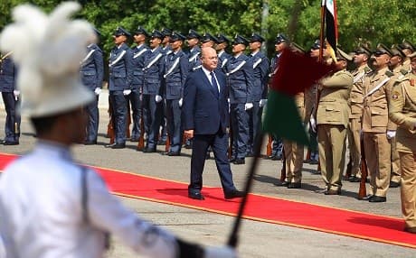 Newly elected Iraqi President Barham Saleh reviews the honour guard during the handing over ceremony in Baghdad on October 3, 2018. Photo: Sabah Arar/AFP