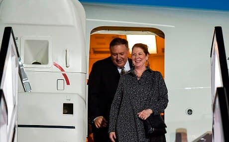 US Secretary of State Mike Pompeo (L) and his wife Susan disembark from their plane as they arrive at Abu Dhabi International Airport in Abu Dhabi, January 11, 2019. Andrew Caballero-Reynolds / AFP / POOL
