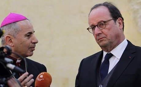 French former President Francois Hollande meets with Christian clergy at a church in eastern Mosul on February 25, 2019. Photo: Robert Edwards | Rudaw
