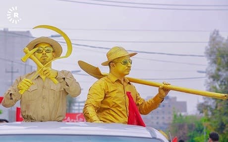 Demonstrators for workers' rights on International Workers Day carry a hammer, sickle, and shovel in Erbil, Kurdistan Region, on May 1, 2019. Photo: Mohammed Shwani/Rudaw