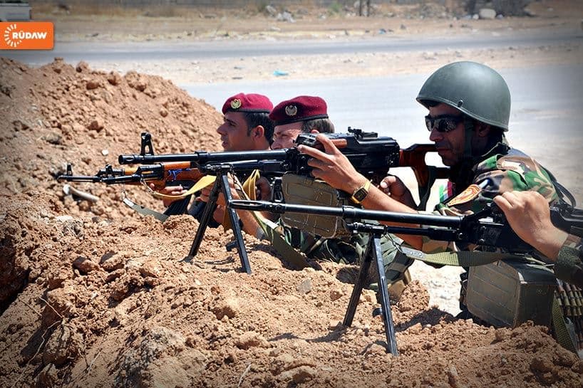 Kurdish Peshmerga forces guarding the last line of defense near Mosul.