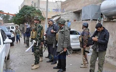 The first Peshmerga officers in Kobane.