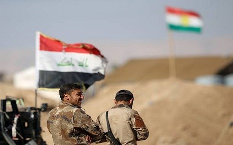 Peshmerga allow Iraqi forces to pass through their frontline en route to the Battle for East Mosul in 2016. File photo: AA