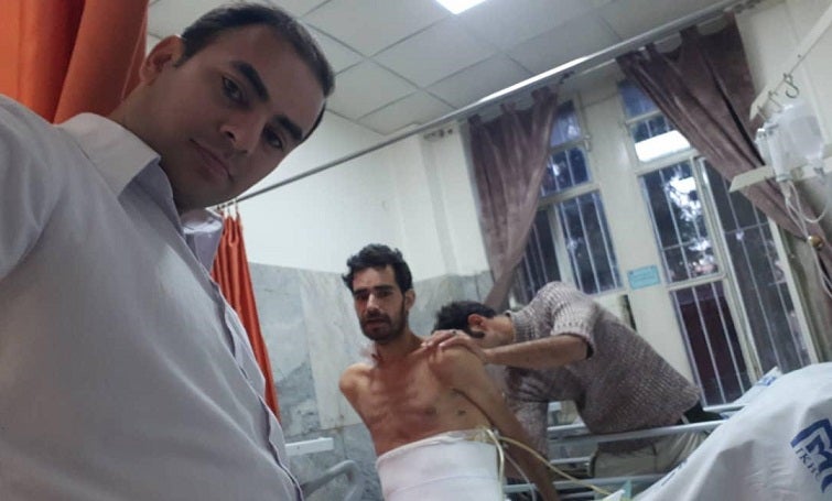 Kamaran takes a selfie with Kayhan on December 11 at Imam Khomeini Hospital in Tehran on December 11 - ten days before Kayhan's death. Photo supplied to Rudaw by Kamaran.