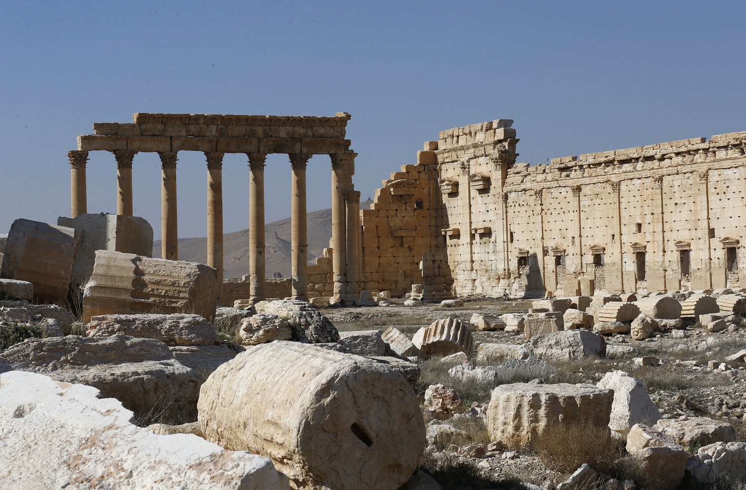 A picture shows the damaged Temple of Bel and surrounding columns in Syria's Roman-era ancient city of Palmyra on February 7, 2021, in the country's central province of Homs. Photo: Louai Beshara / AFP