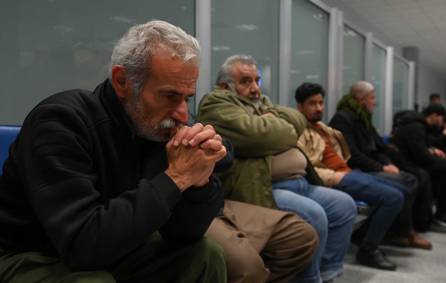 Rizgar Hussein, who lost his wife and three children in the English Channel tragedy, waits to receive their bodies in Erbil airport on December 26, 2021. Photo: Bilind T. Abdullah / Rudaw