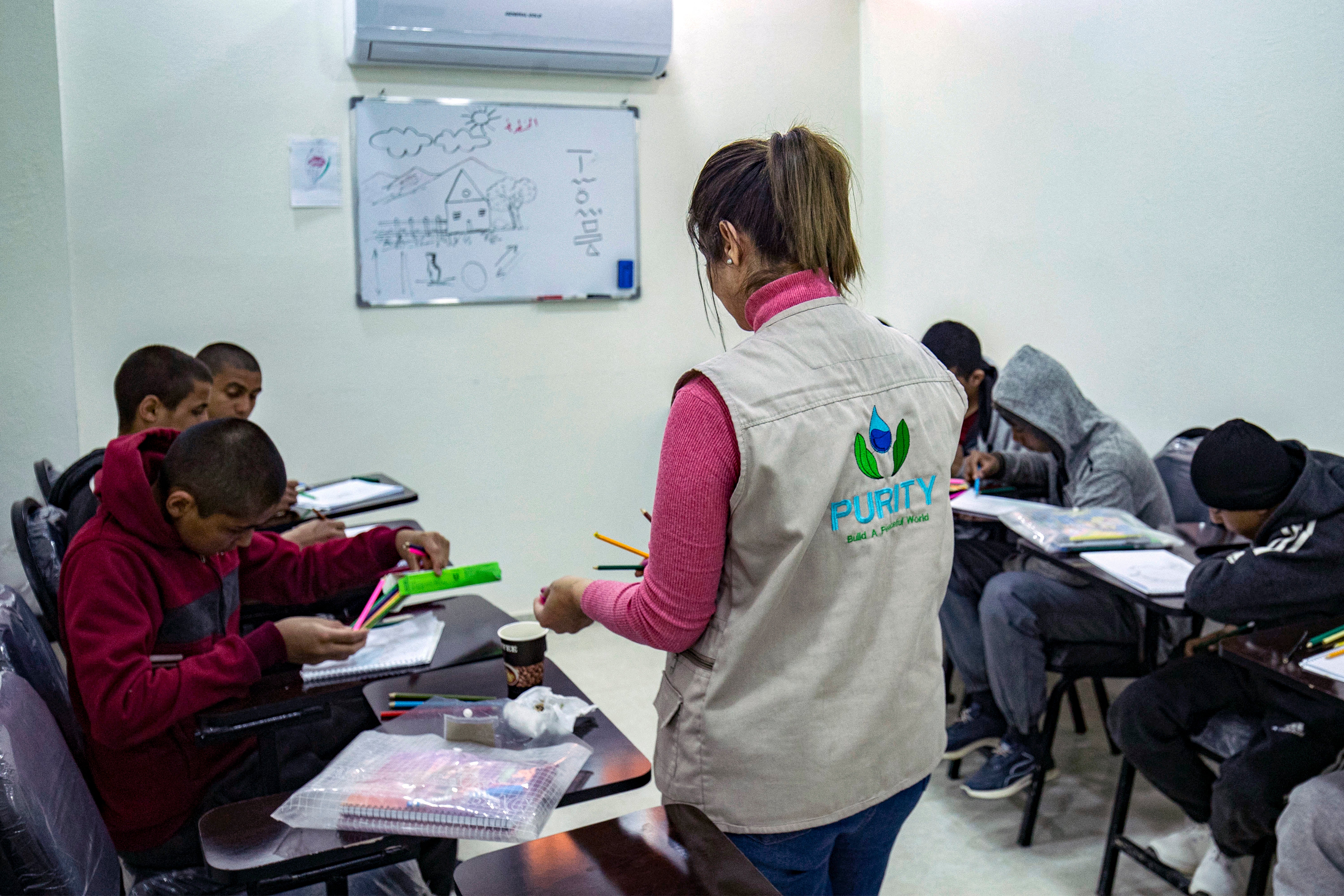 Children of foreign Islamic State (IS) fighters attend an arts class at the Orkesh rehabilitation centre in the countryside of Qamishli in northeastern Syria on March 7, 2023. Photo: Delil Souleiman/AFP