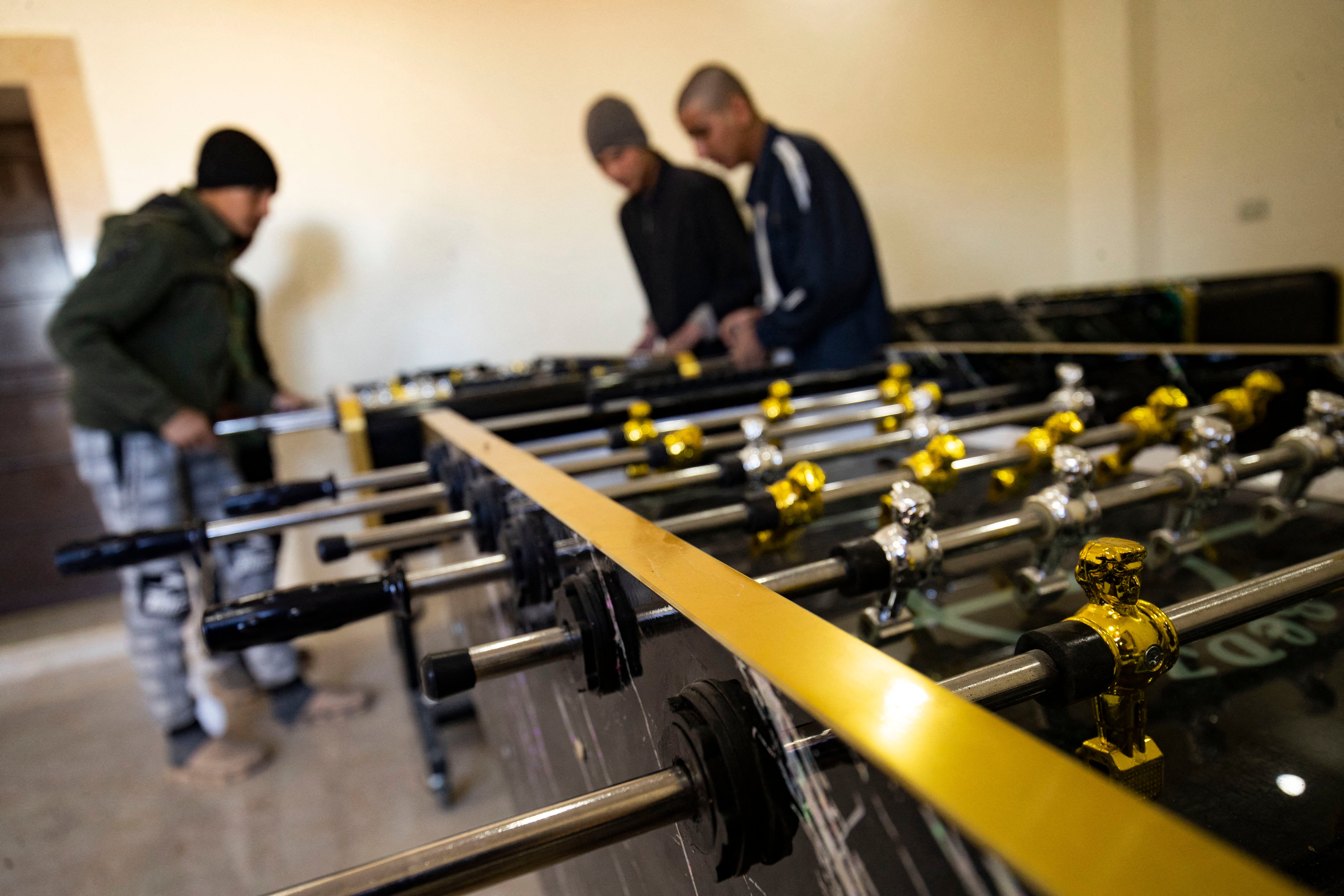 Children of foreign Islamic State (IS) fighters play table football (foosball) at the Orkesh rehabilitation centre in the countryside of Qamishli in northeastern Syria on March 7, 2023. Photo: Delil Souleiman/AFP