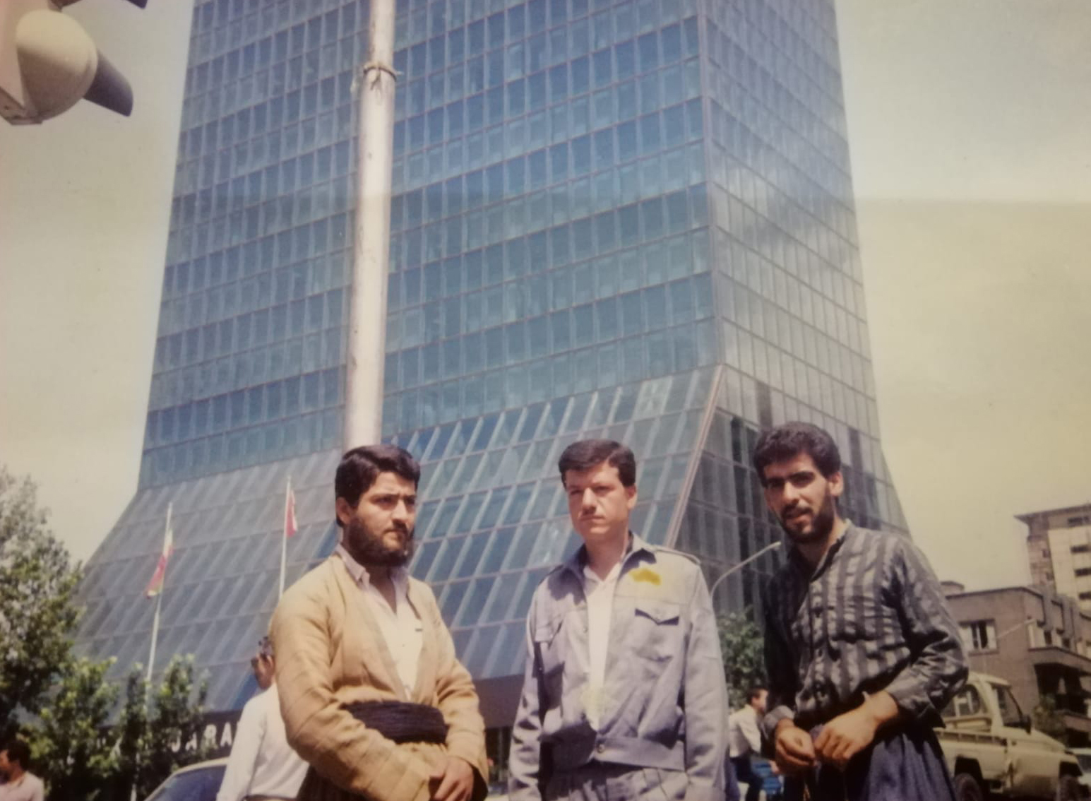 Tahir Karim (left) with his cousins in northern Iran in 1988. “We do not have any photos where we’re smiling because we were still in shock,” said Karim.