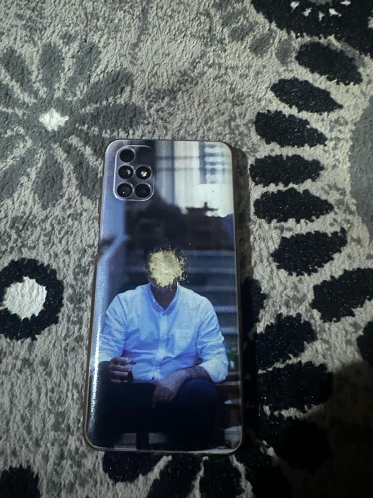 A photo submitted shows an image of jailed Kurdish politician Selahattin Demirtas on a phone case. His face in the image has been scratched out.