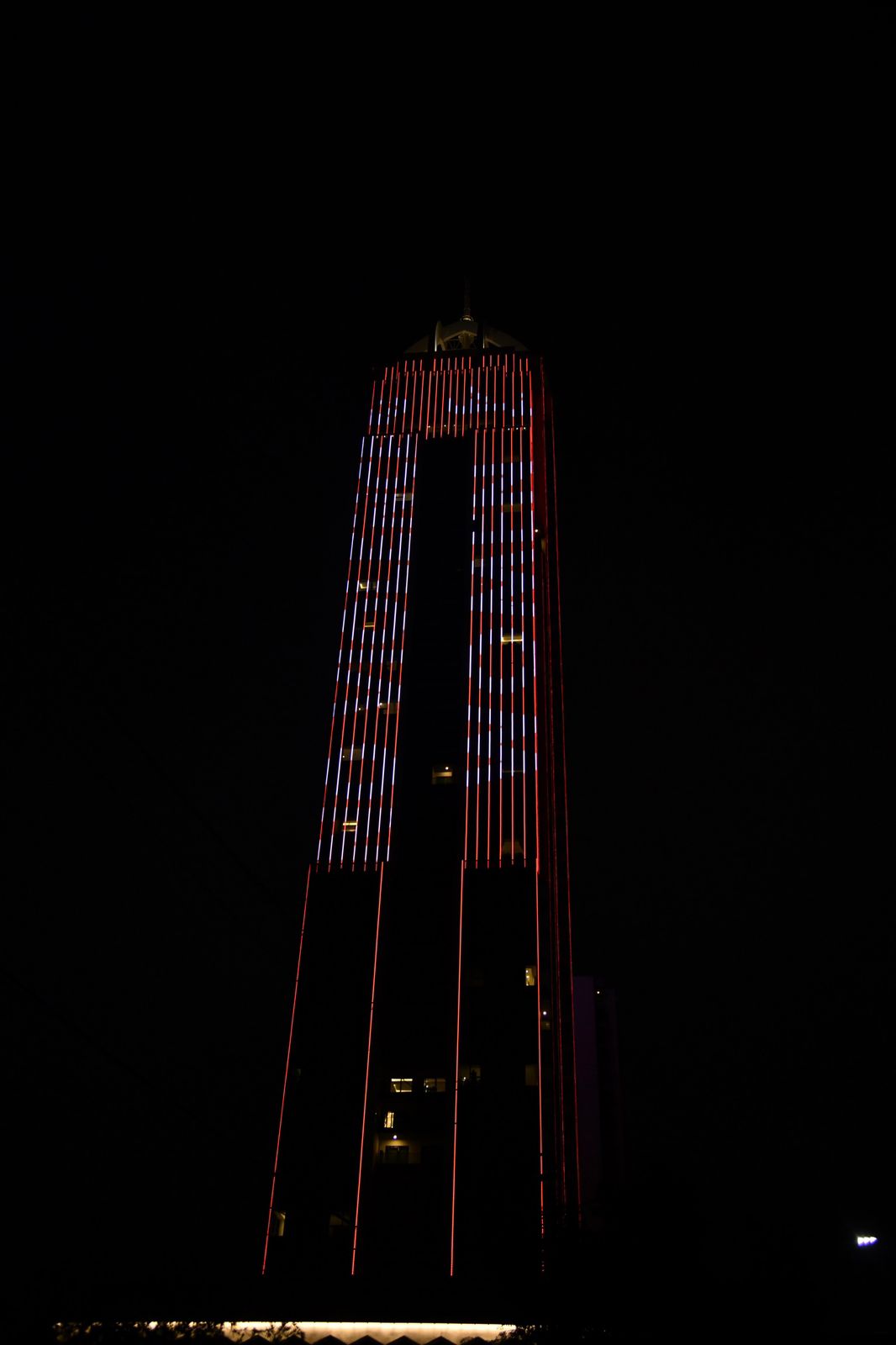 Erbil's Zaniary Tower lit up orange on November 26, 2023. Photo: KRG