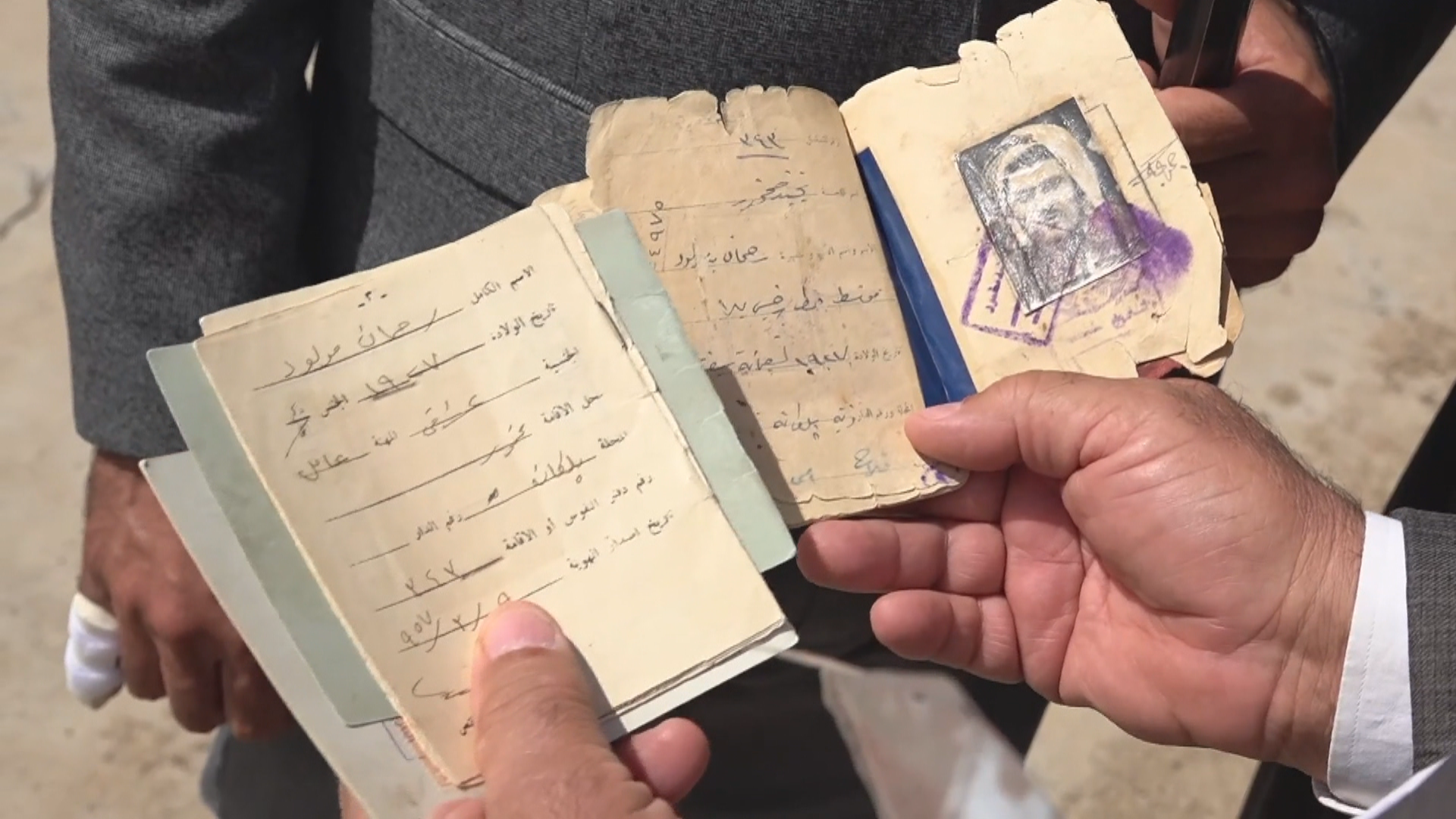 A Kurdish farmer shows Rudaw reporter documents he claims prove his ownership of his farmland in Palkana. Date: May 9, 2024. Photo: Rudaw