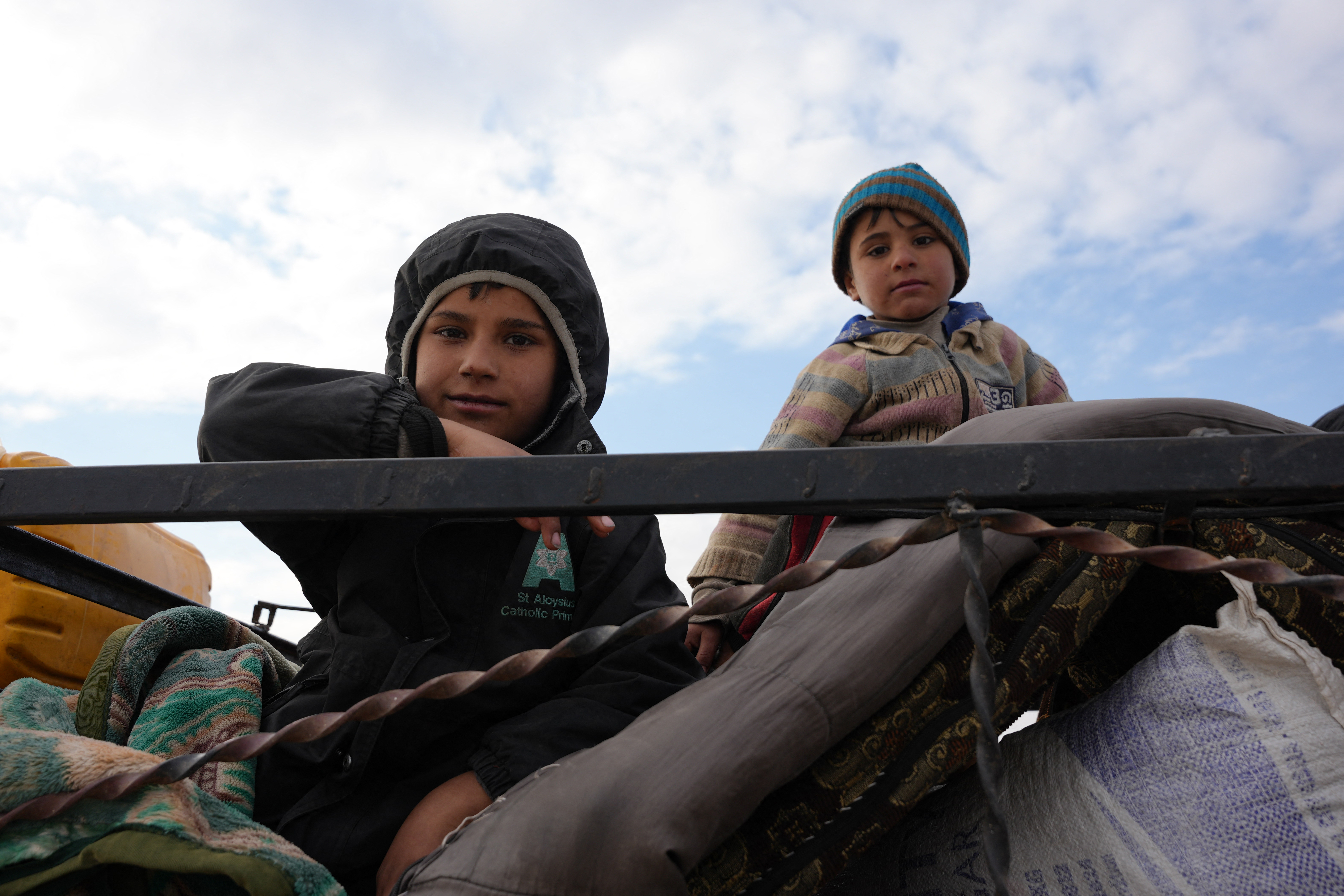 Koçberên Efrînî yên ku vegeriyane/Wêne: AFP