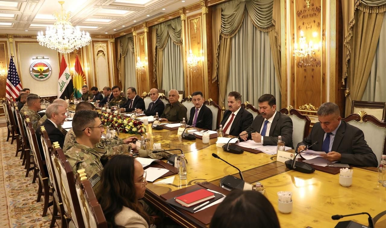 وێنەیەکی کۆبوونەوەکە.