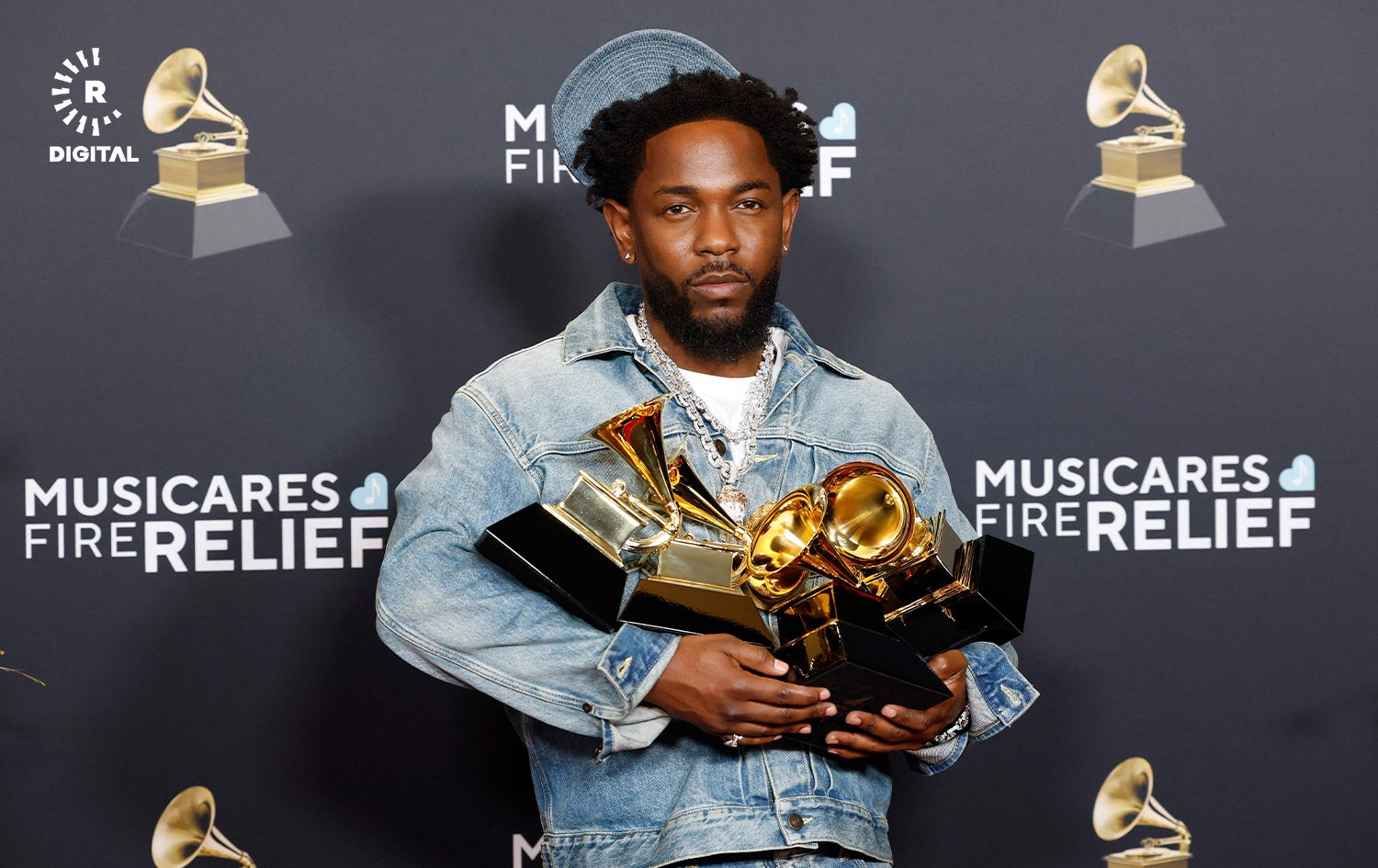 کێندرێک لامار، براوە چوار خەڵاتی گرامی. وێنە: AFP