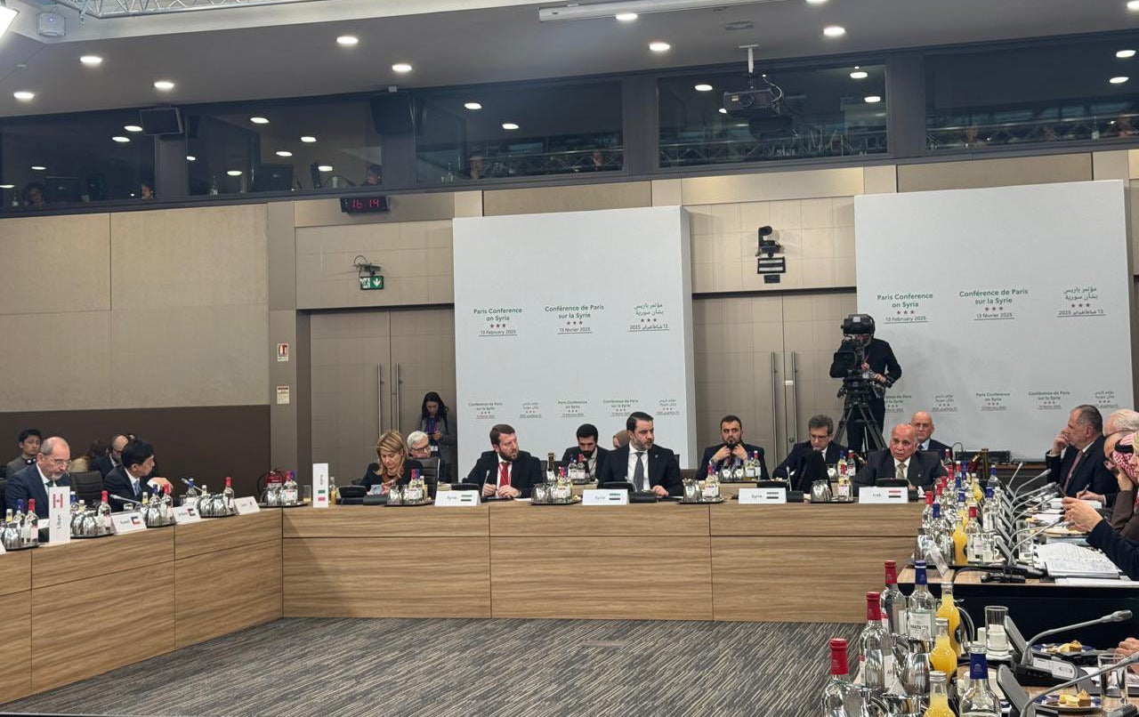 دیمەنێکی کۆنفرانسەکەی پاریس.