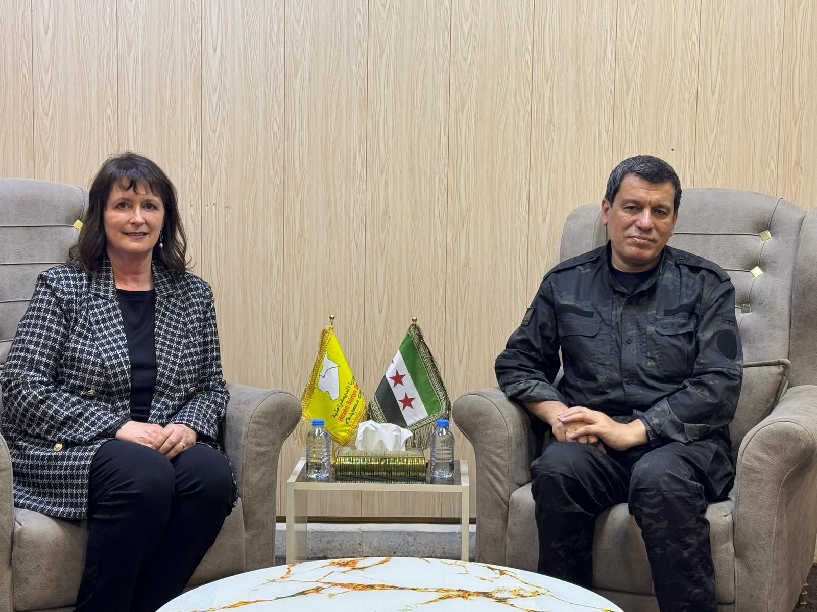 Nadine Maenza (left) and SDF chief Mazloum Abdi meeting in Rojava on April 15, 2025. Photo: Nadine Maenza/submitted