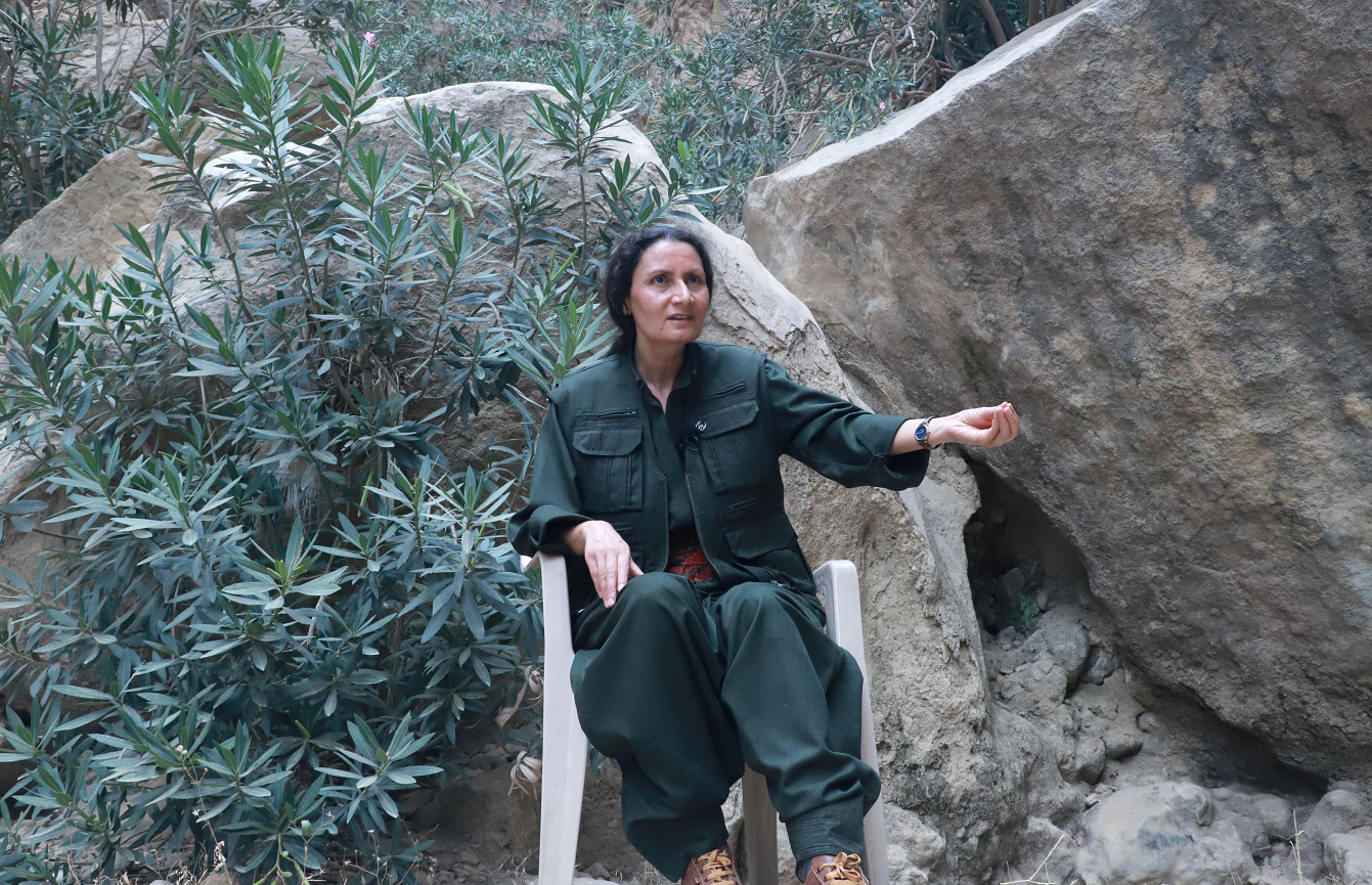 KCK co-chair Bese Hozat speaking to AFP near Jasana Cave in Sulaimani province, where she and 29 other PKK fighters burned their weapons on July 11, 2025. Photo: AFP