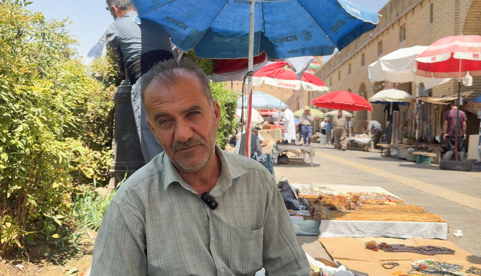 Tahsin Omar, a prayer beads seller near Erbil's citadel, speaks to Rudaw English on July 22, 2025. Photo: Sehend Mayiwar/Rudaw