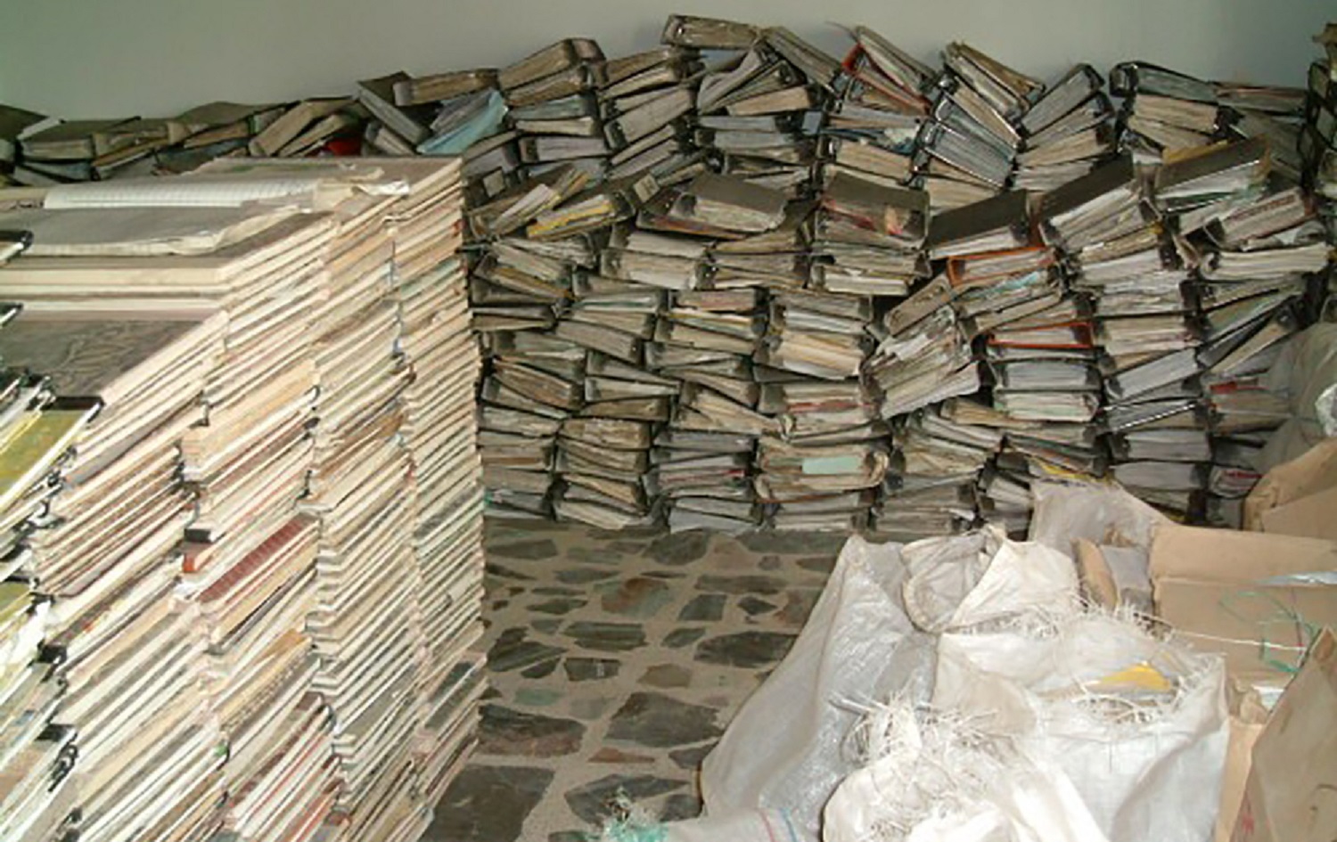 This handout picture provided by the Iraq Memory Foundation on September 10, 2020, shows documents that were found in one of the Baath Party’s headquarters in the Iraqi capital Baghdad at an unknown date, piled up after being collected by the foundation. Photo: Iraq Memory Foundation/AFP