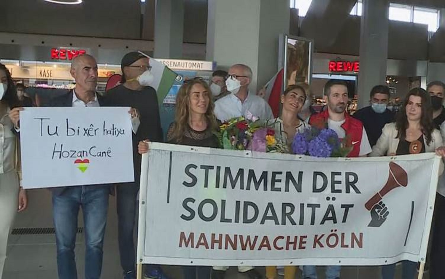 Hozan Cane was welcomed back to Germany by her daughter, family, and friends in Cologne on July 15, 2021. Photo: Rudaw