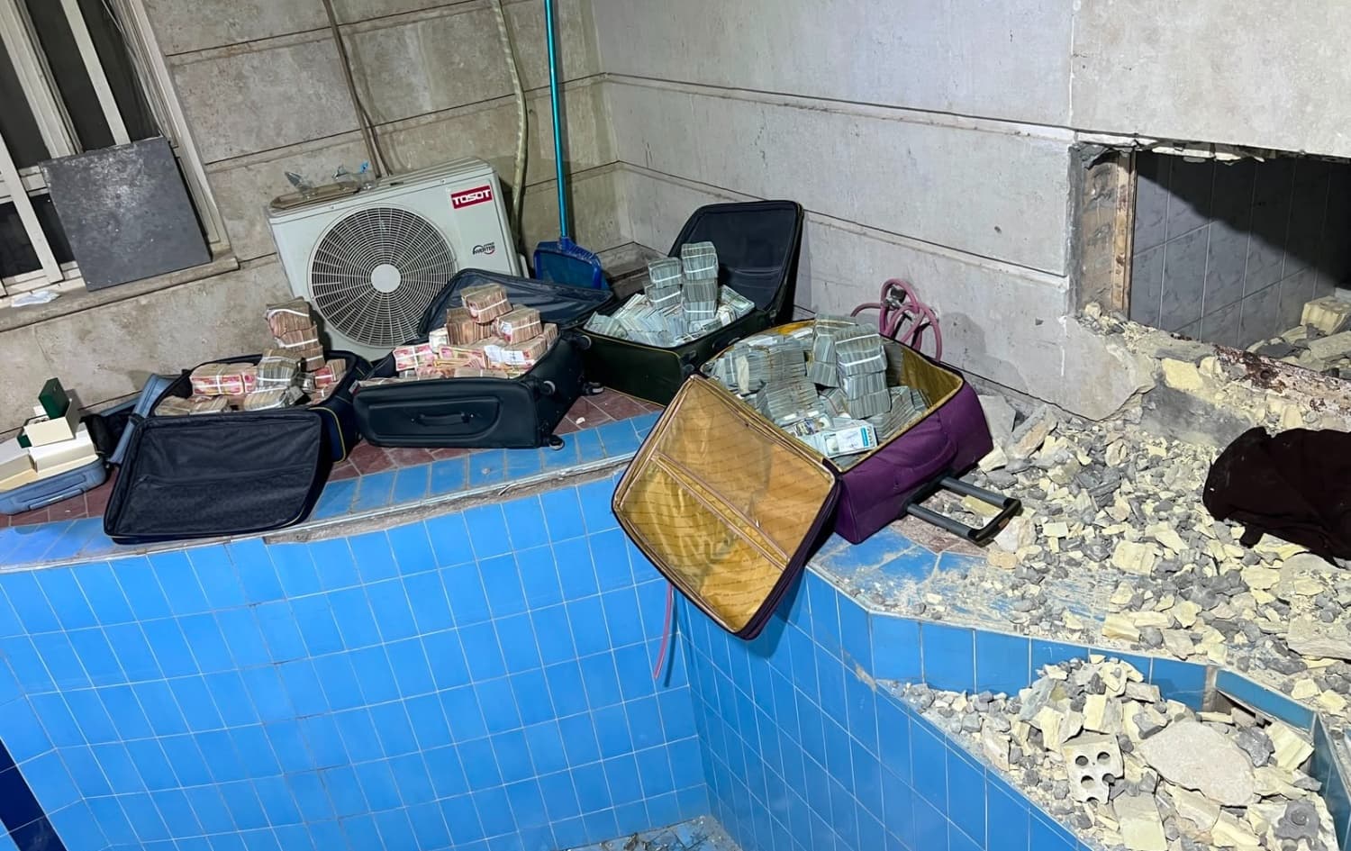 لە ماڵەکەی عەلی مەعارجدا دەست بەسەر 11 ملیۆن دۆلار و چوار ملیار دیناردا گیرا